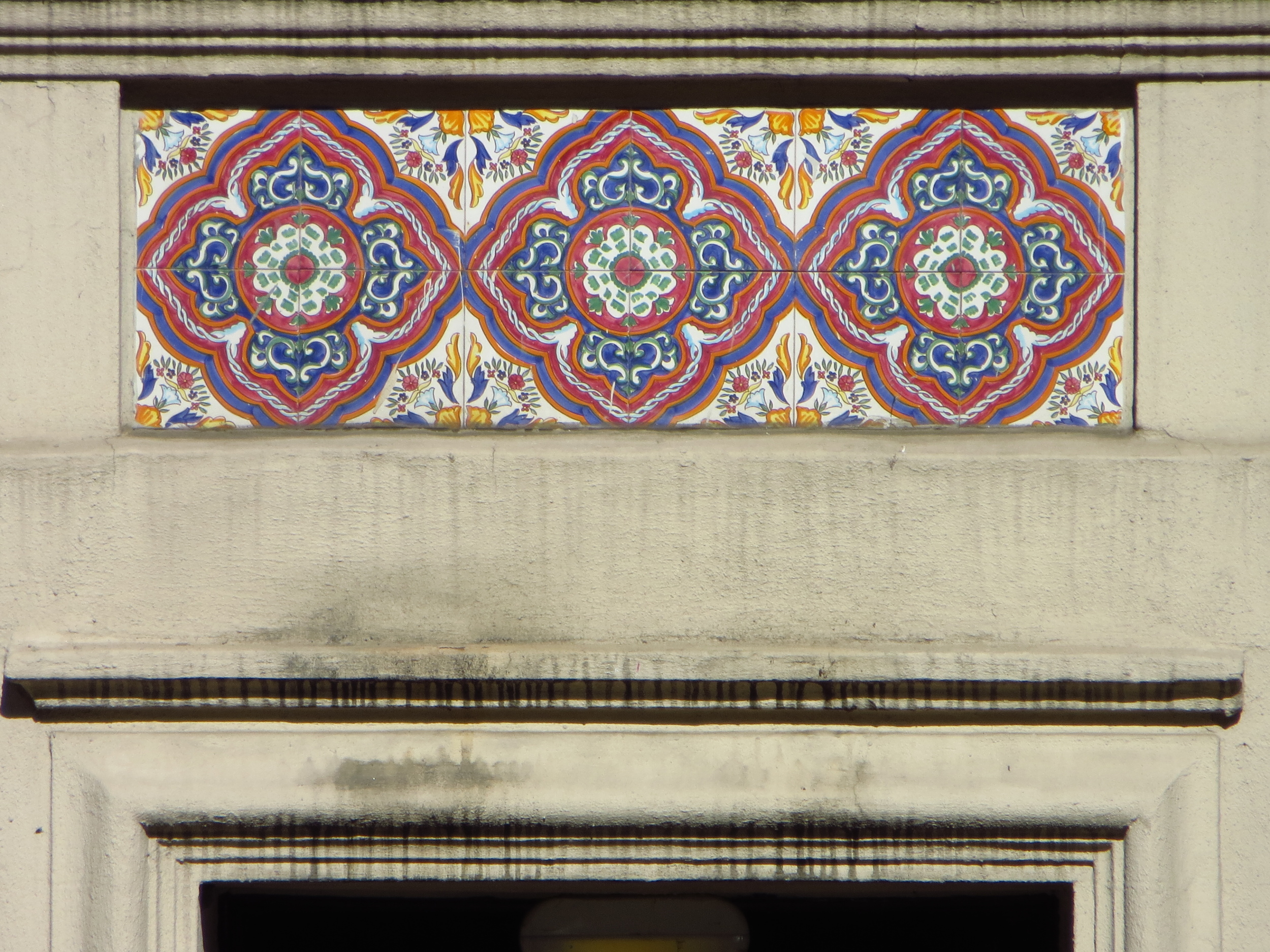 Pretty tiles over a door