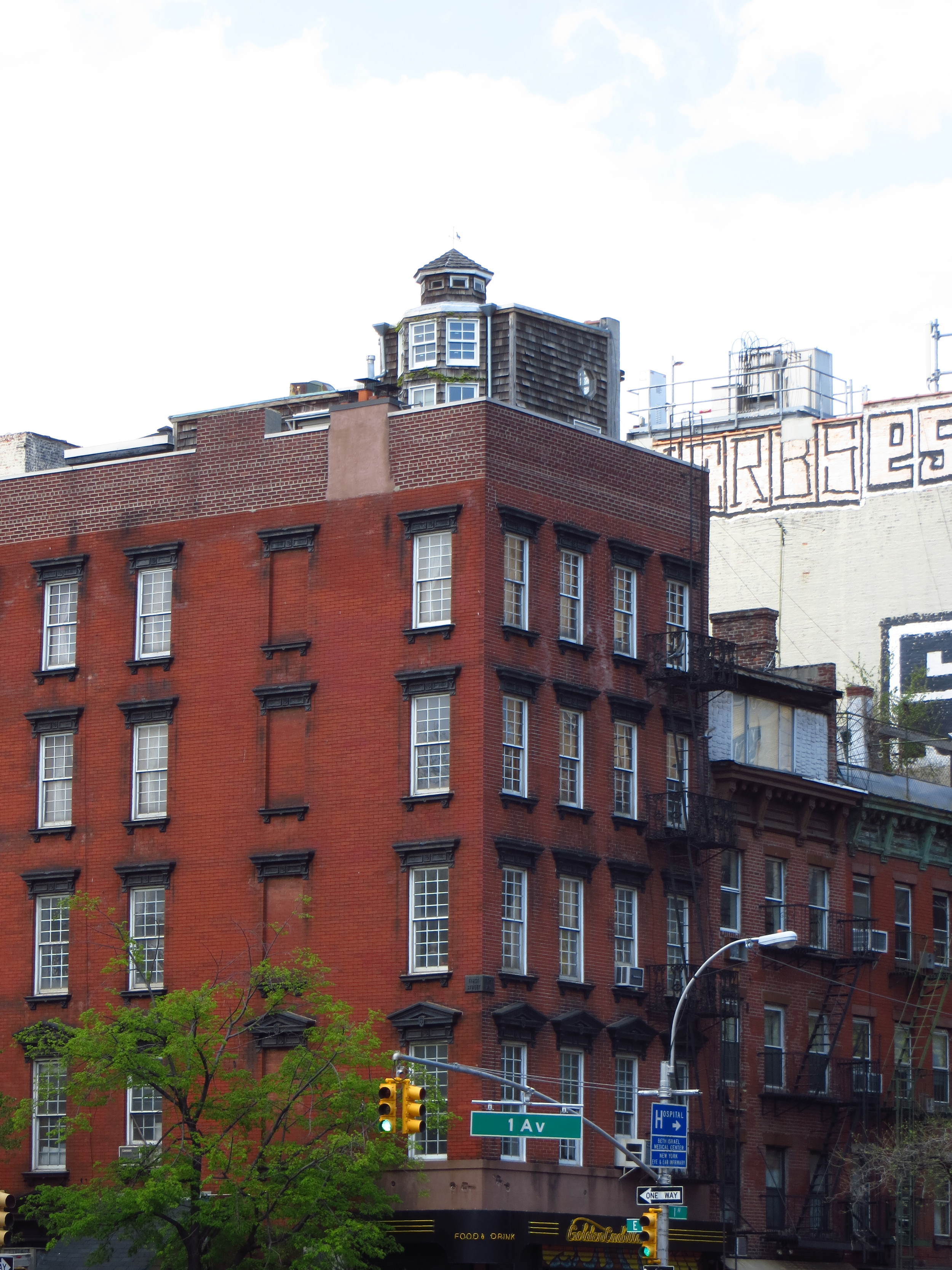 House on top of an apartment building