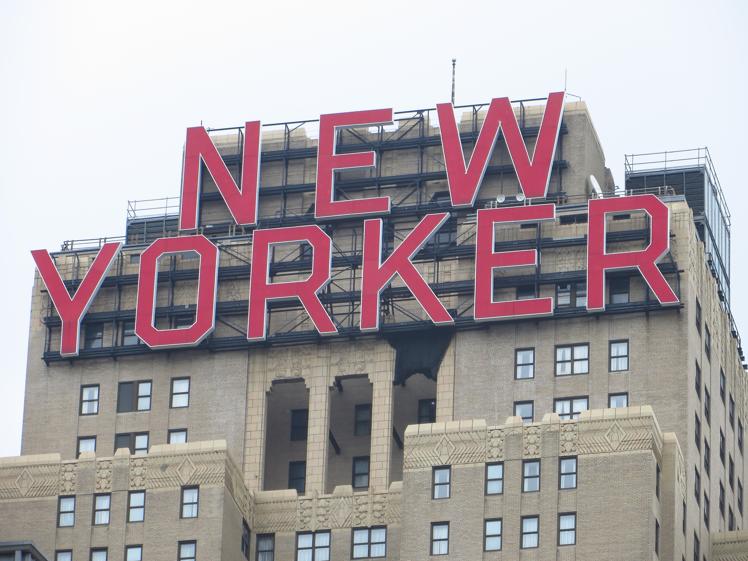 New Yorker Hotel sign