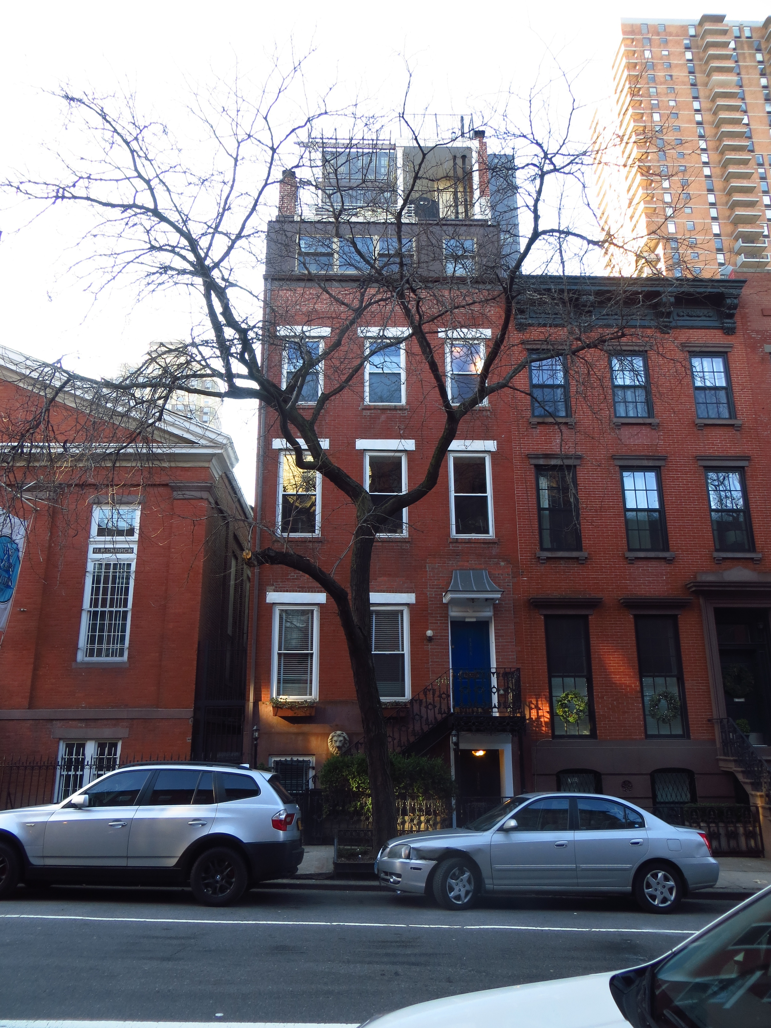 Cool row house (there's an awesome penthouse on top)