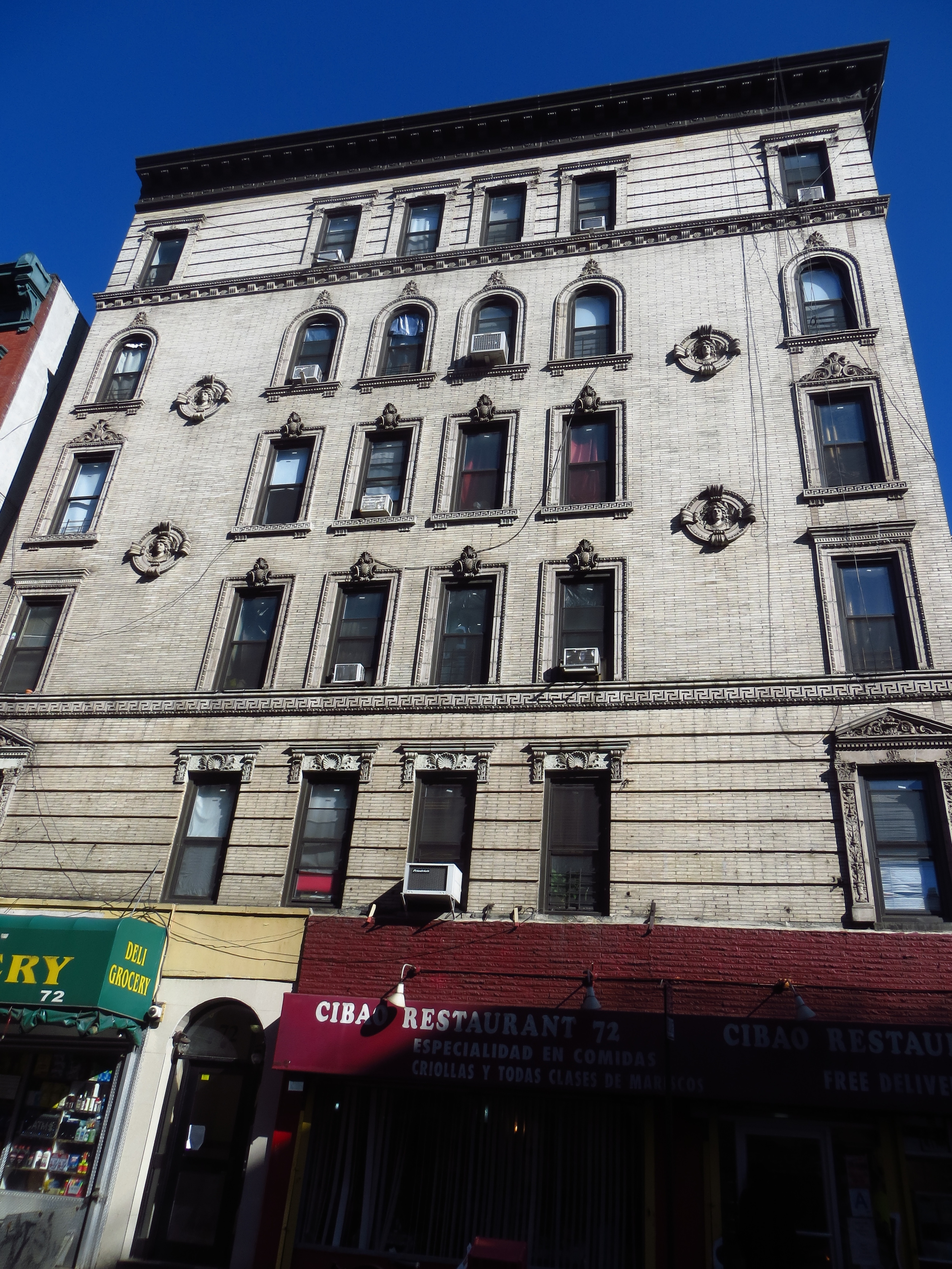 I liked the brickwork and faces on this building