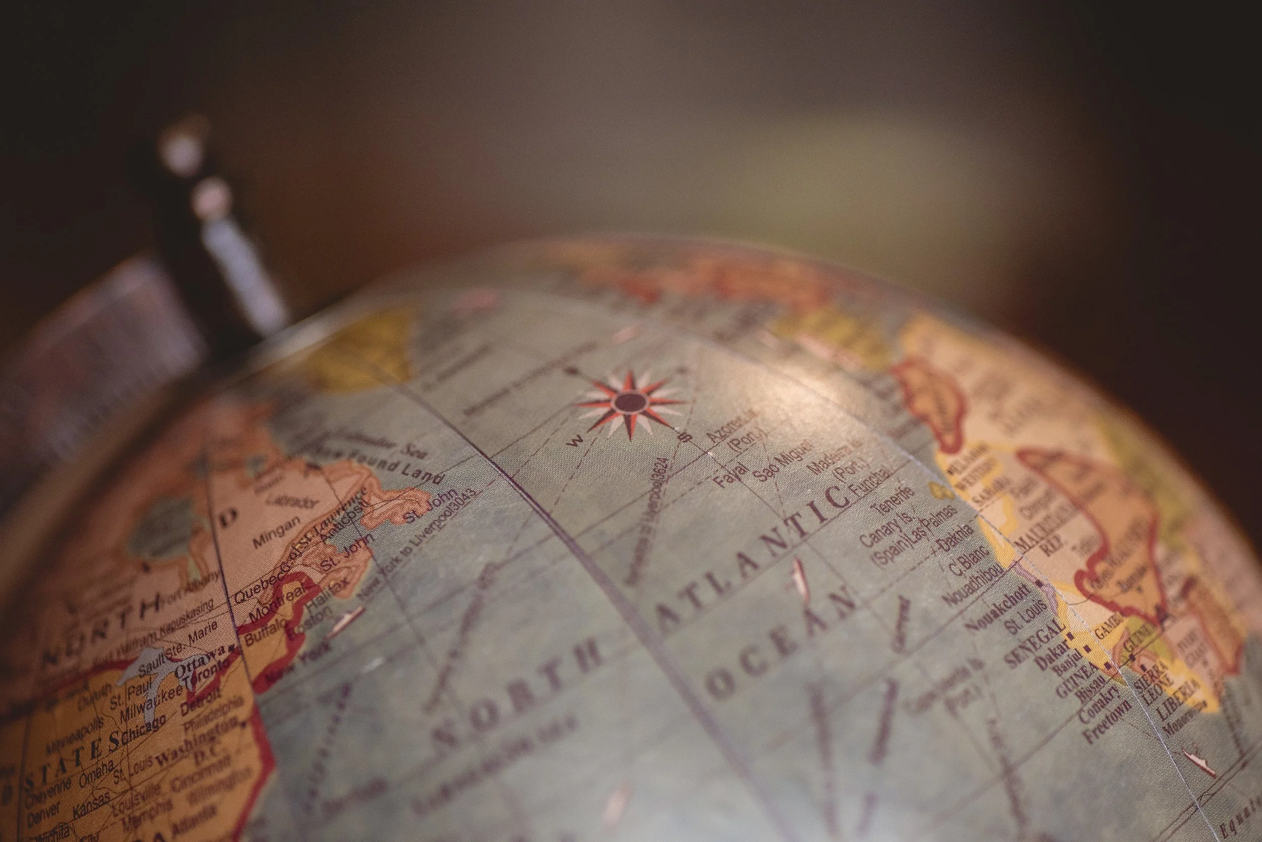 closeup-shot-desk-globe-with-blurred-background.jpg
