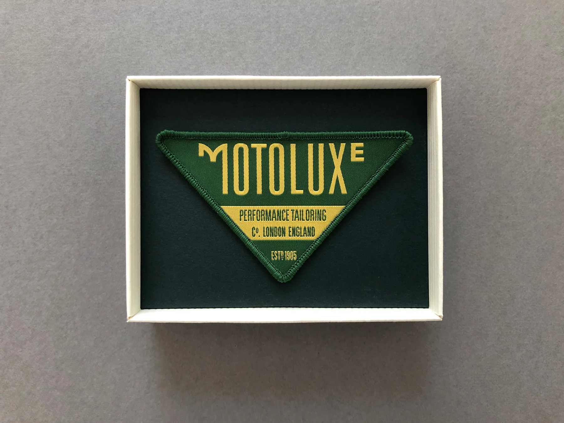 Motoluxe_Triangle_Embroider_Logo_2.jpg