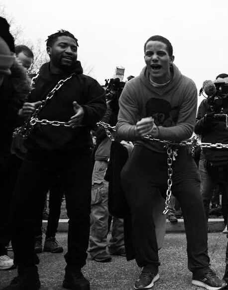 Myself and James Williams ’18 participating in a direct action during Donald Trump’s inauguration. Feb 2017.
