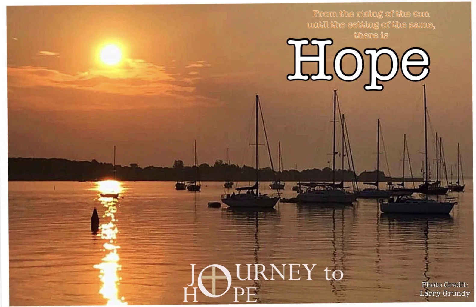 Sunrise over the water in Connecticut. Photo by Larry Grundy