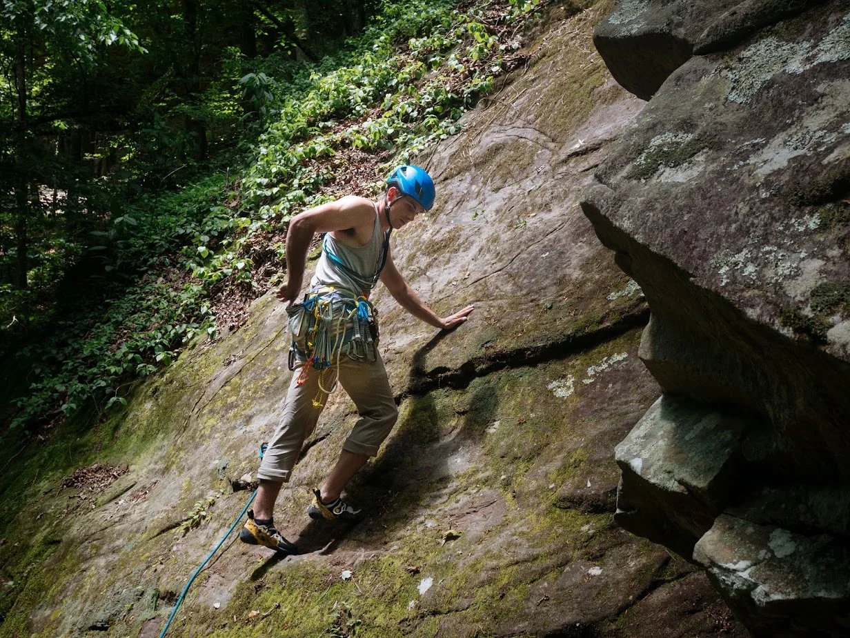 Jon braving the ice-like moss on the bolted portion of the slab.