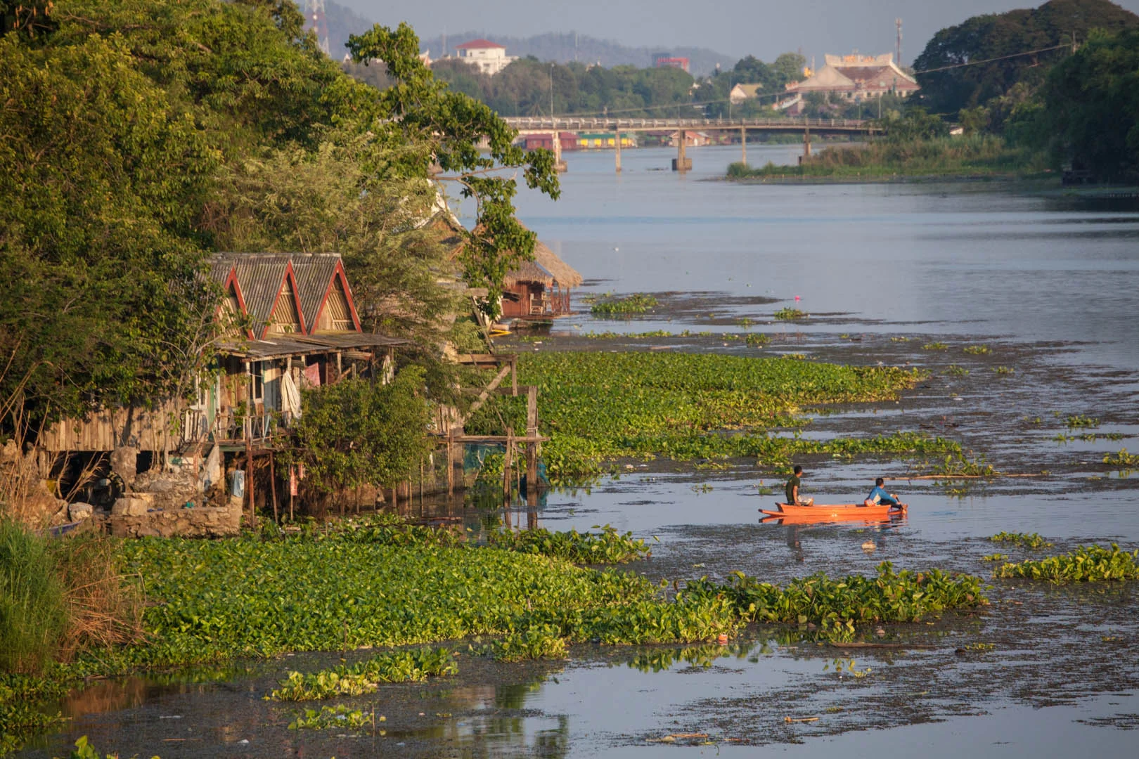 Ah, and this is our accommodation on the river, the bungalow at the back. It was an experience...