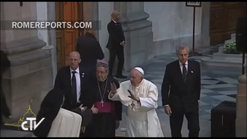 Hug attack? Pope Francis says....not now....