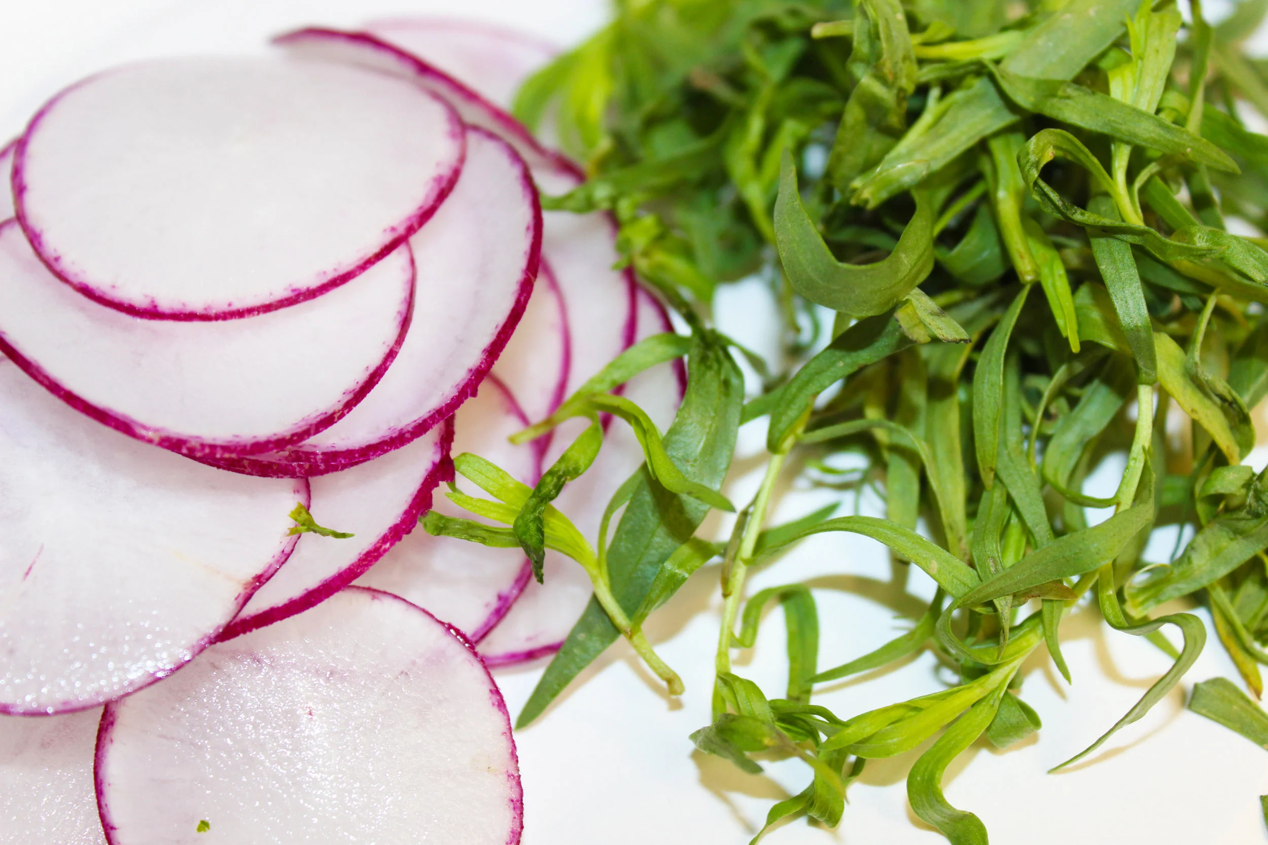 radishes offer a peppery punch to the sweet tarragon in this dish