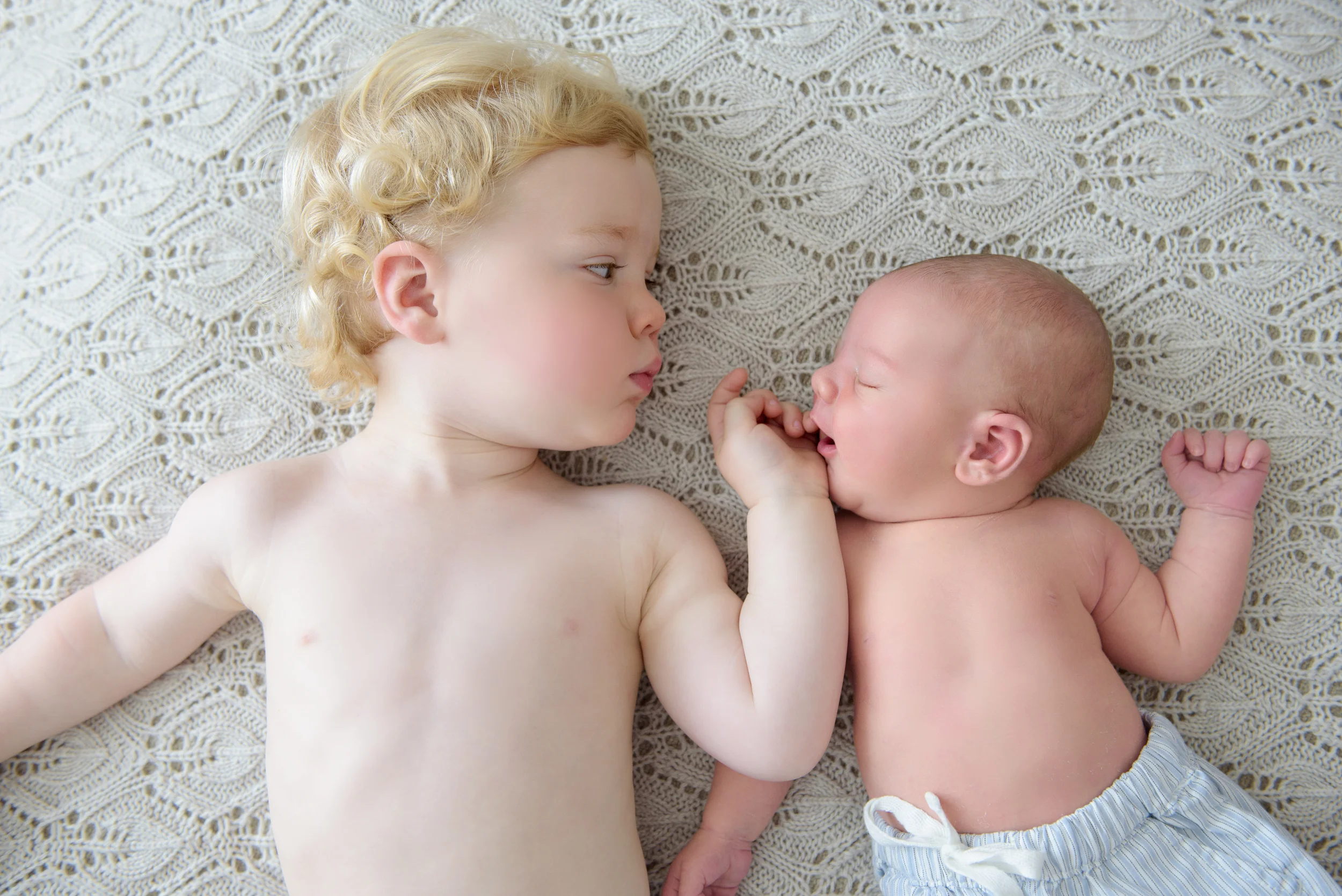 Newborn photography with older sibling