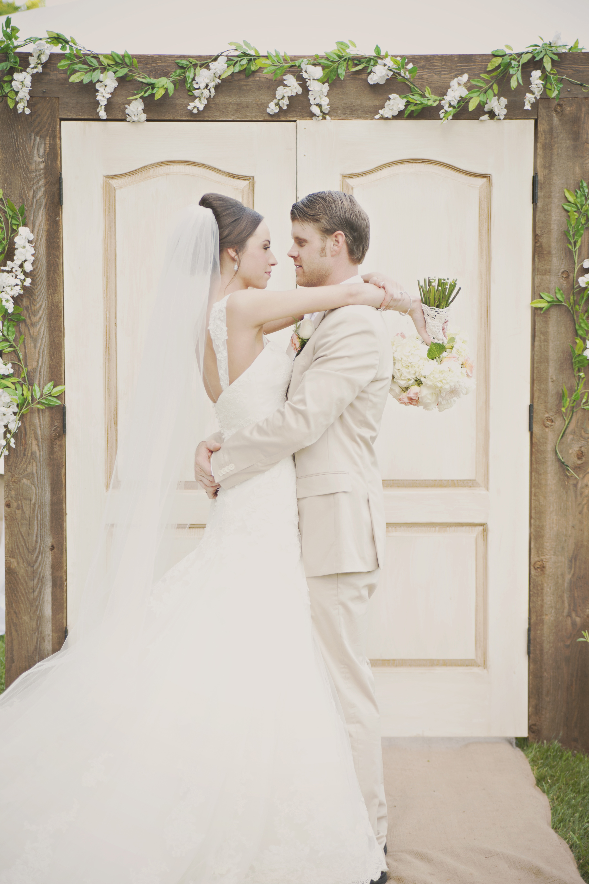 This bride had rustic doors for her outdoor ceremony entrance. They were just beautiful!