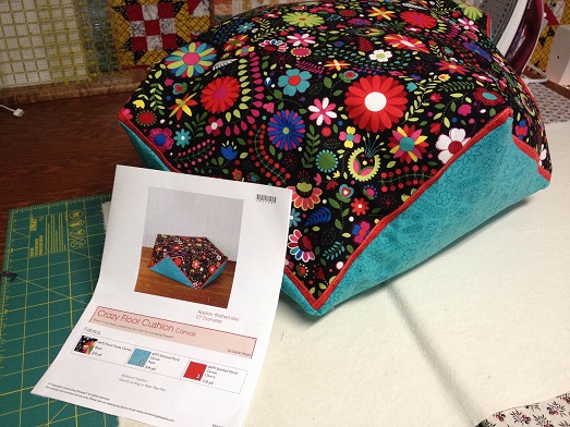 Easy to make Crazy Floor Cushion by Connecting Threads. Bright colors too!