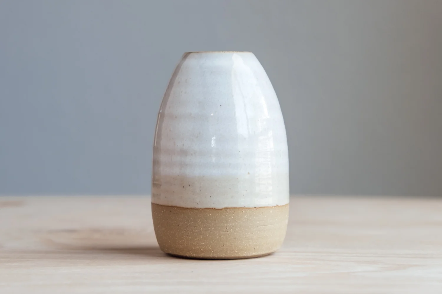 Bud Vase - Eggshell $16.50 Wholesale | $28 MSRP Approx. 4.5" tall x 1.5" wide opening