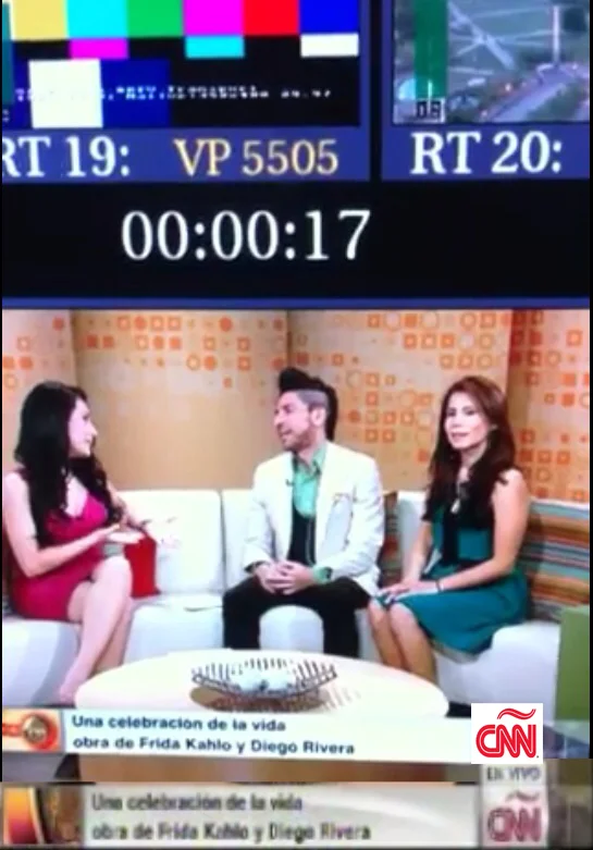 Television broadcast showing three people sitting on a sofa discussing Frida Kahlo and Diego Rivera's work. The screen has text overlays including a countdown timer and the CNN logo.