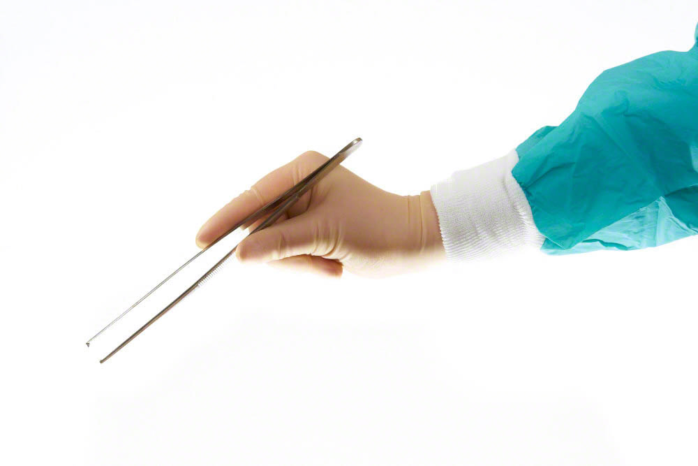 Surgical foreceps held by surgeons hand