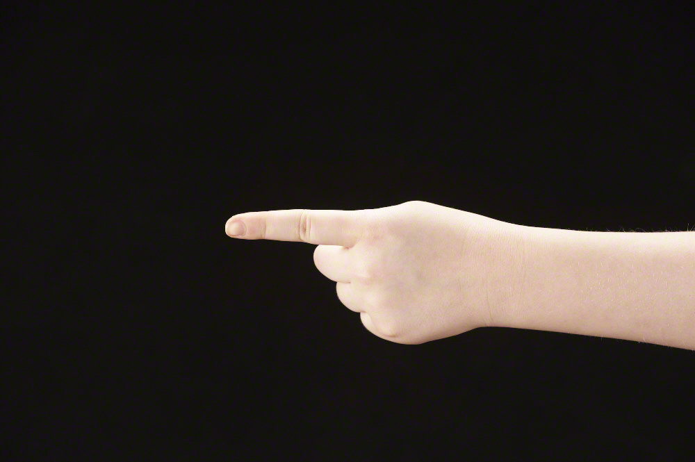Index finger pointing - girls hand