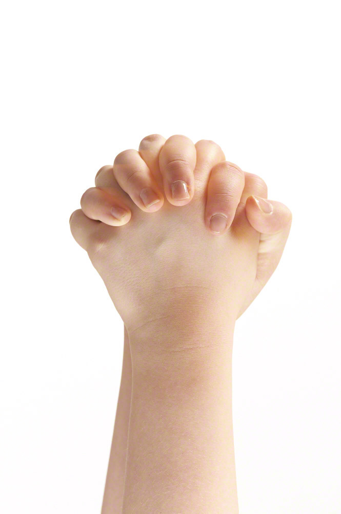 Folded hands of child