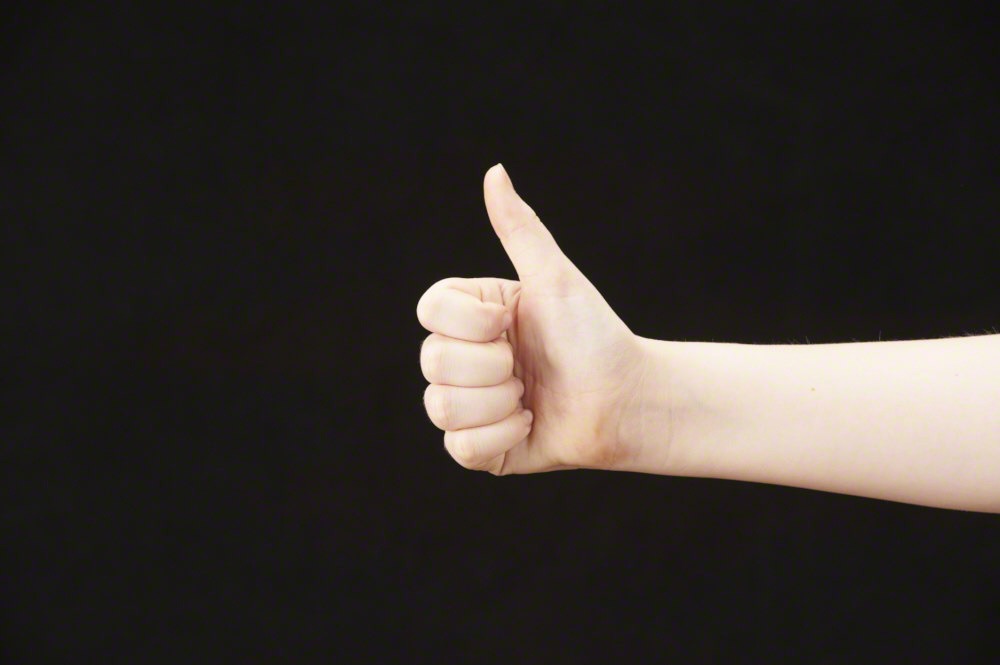 Thumb up - girls hand