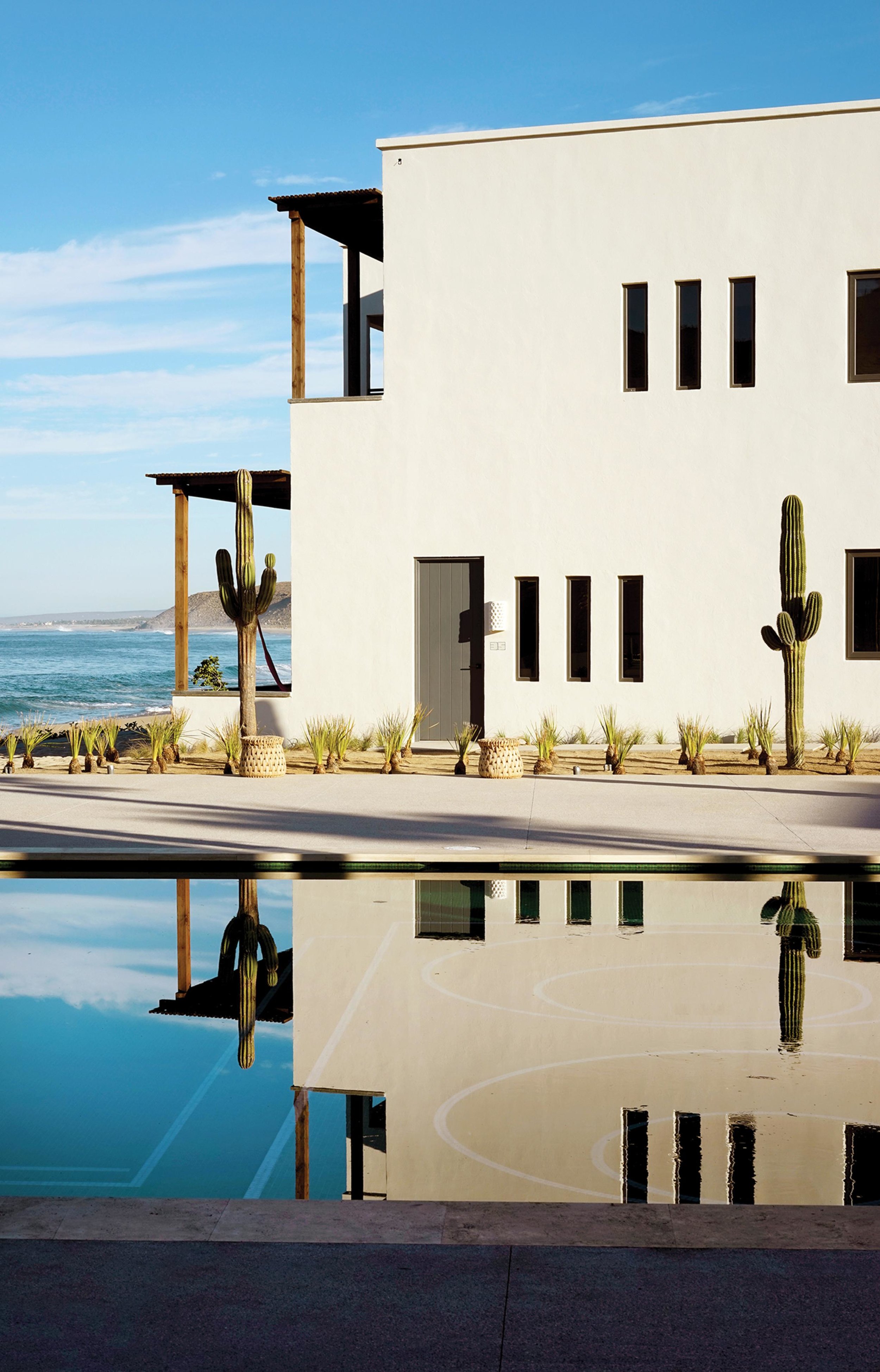 THE LIFE AQUATIC | The pool area of Hotel San Cristóbal, which overlooks Playa Punta Lobos. Photo: Pia Riverola for WSJ. Magazine