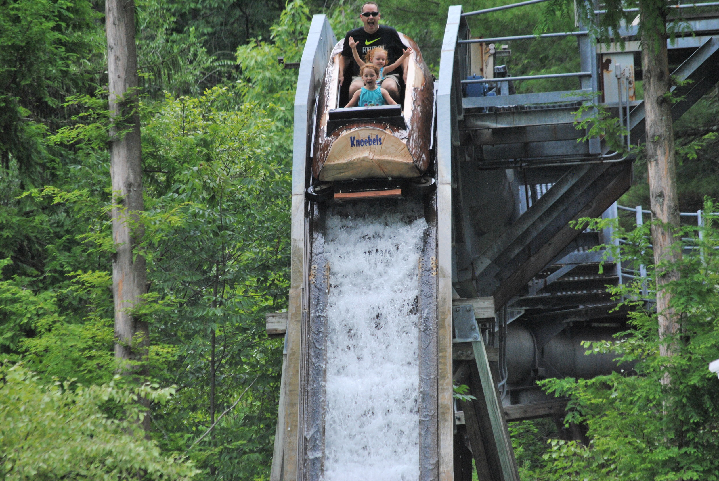Tom, husband of Katie Bonner (Purchasing), and their daughters Quinn and Kailin enjoying their first ride on the Log Flume at Knoebels Grove.