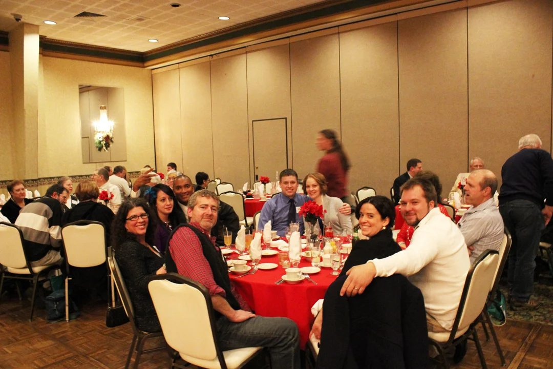 Employees enjoying conversation at the party