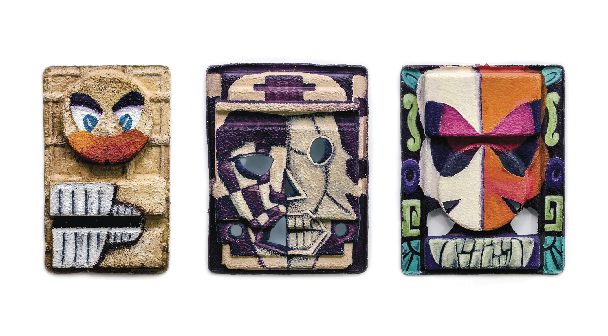 Masks // Acrylic on recycled packaging.