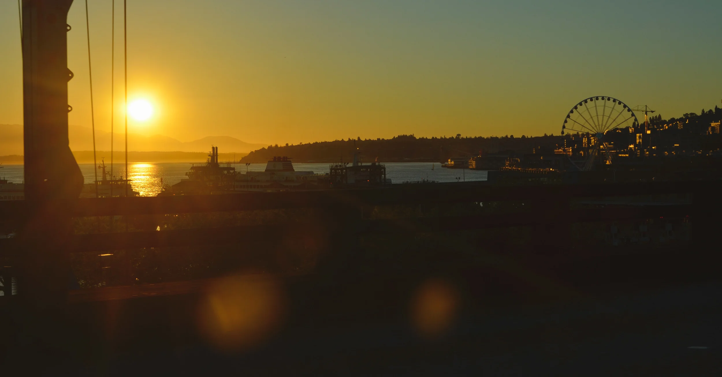 Sunset over the waterfront as seen from the highway going into Seattle