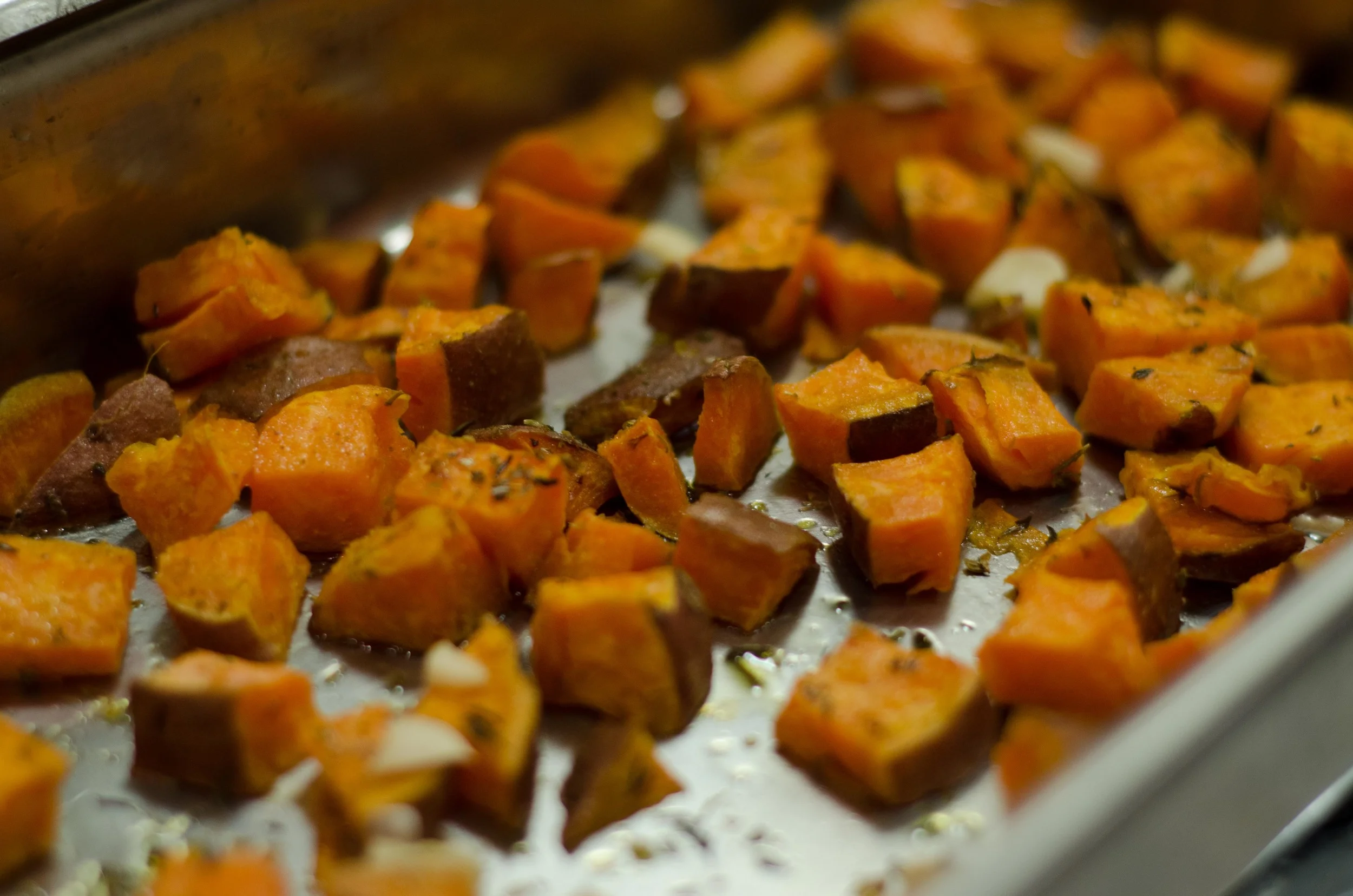 Human feeding time: roasted sweet potatoes with herbs, thanks to Alex. Nom nom.