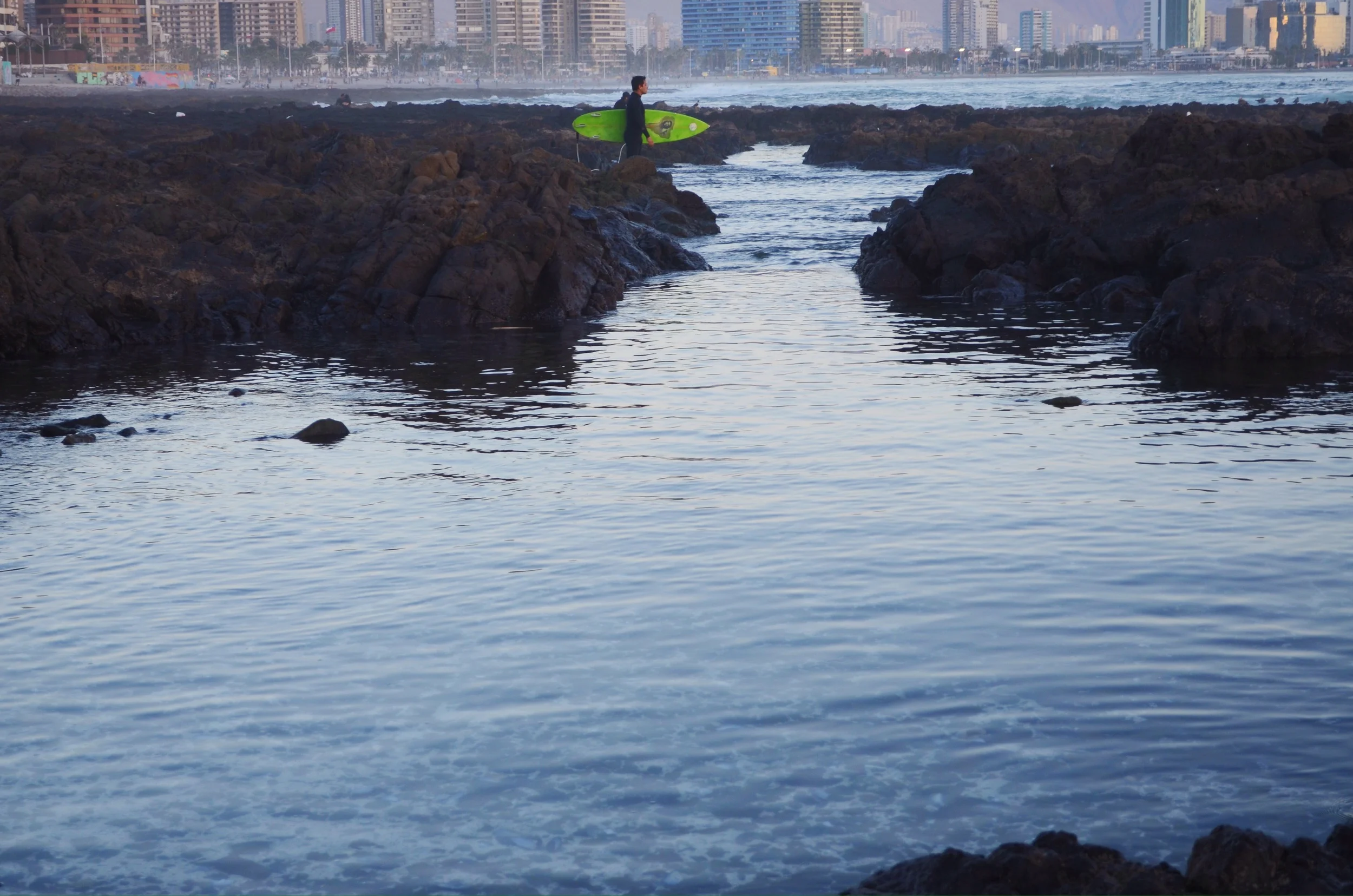 Surfer gauging the waves at dusk // 5 april 2015