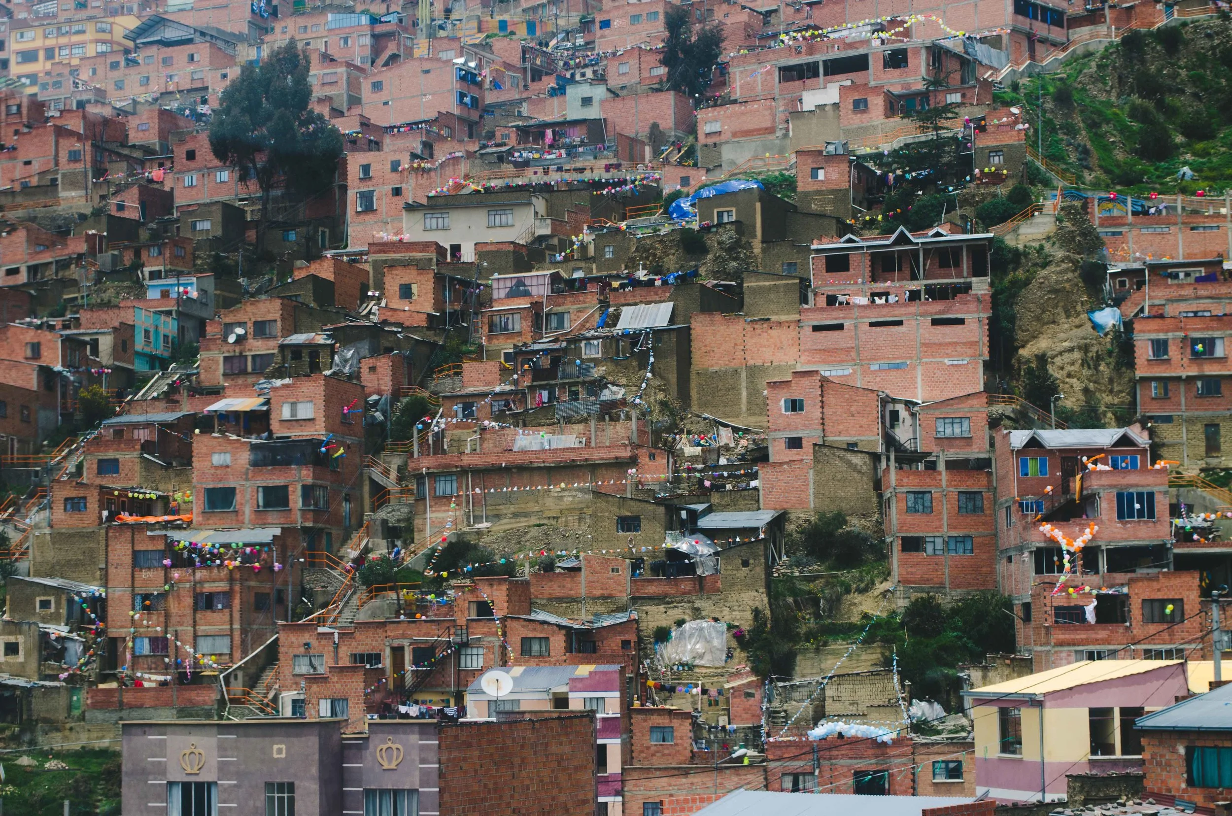 it was a holiday so firecrackers echoed between the hills and families put out balloons and streamers