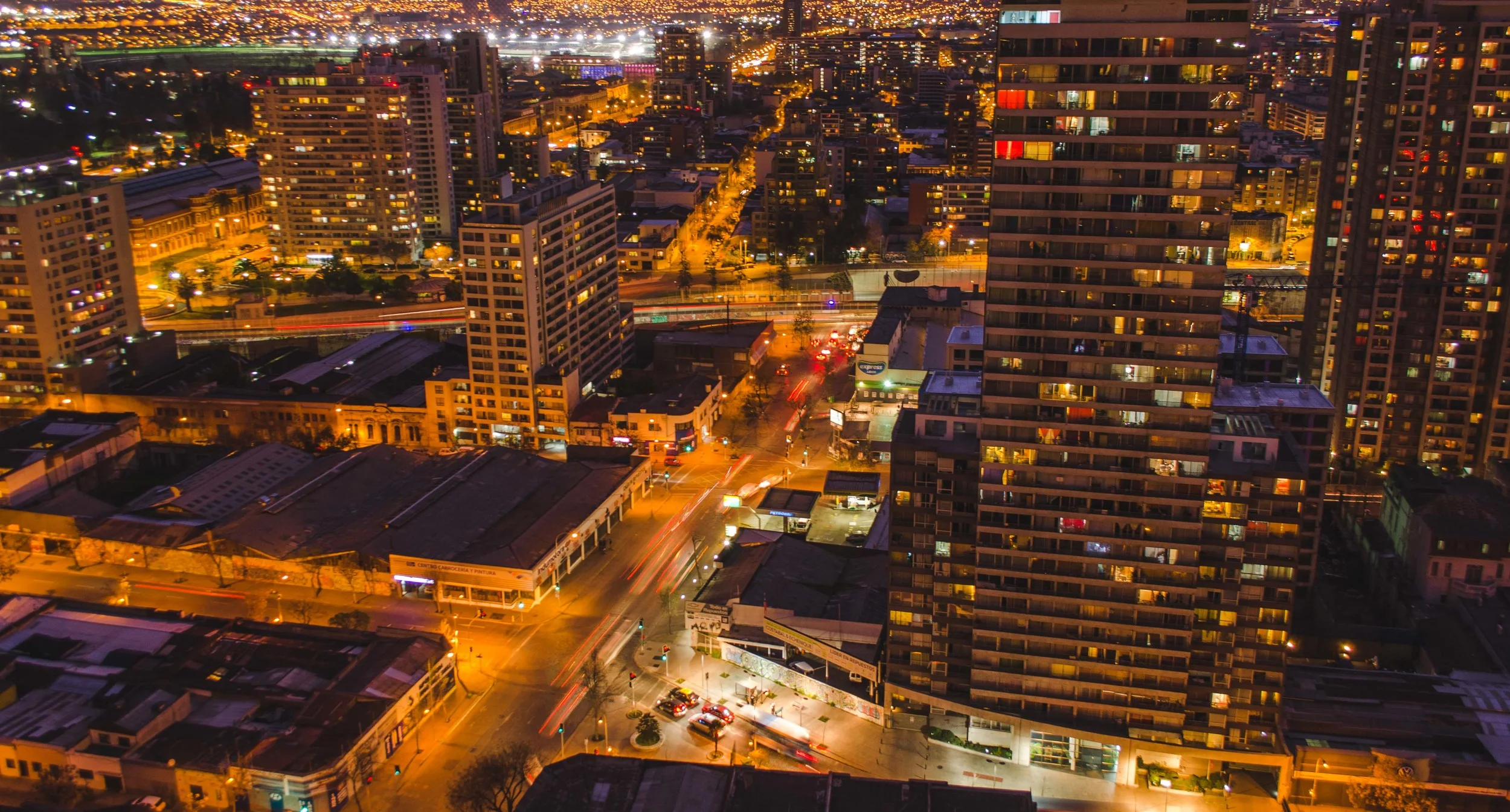 so much light at night. the wall of high-rise buildings and transit arteries is overwhelming, especially taking off from the airport at night. the lights are seemingly endless.