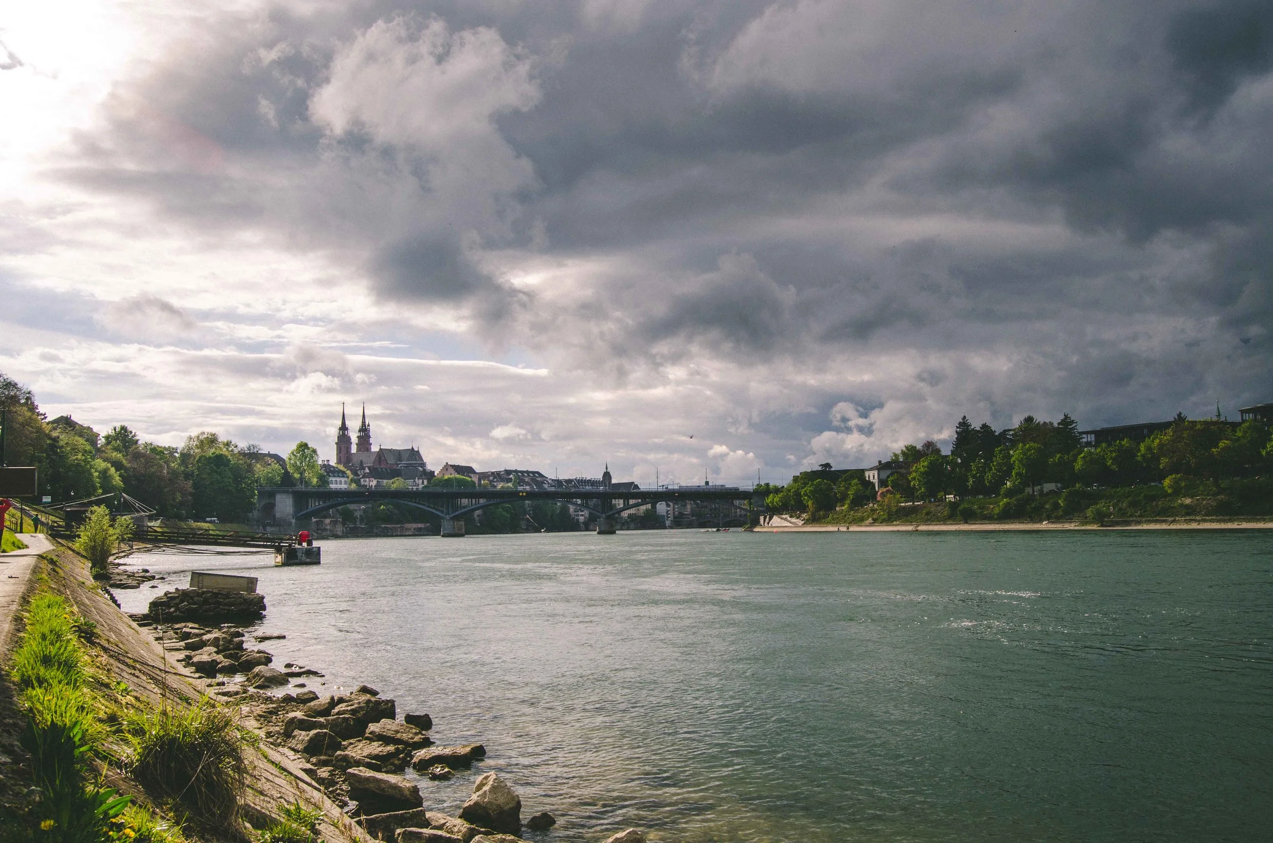 Sitting on the banks of the Rhine, watching the sky roil