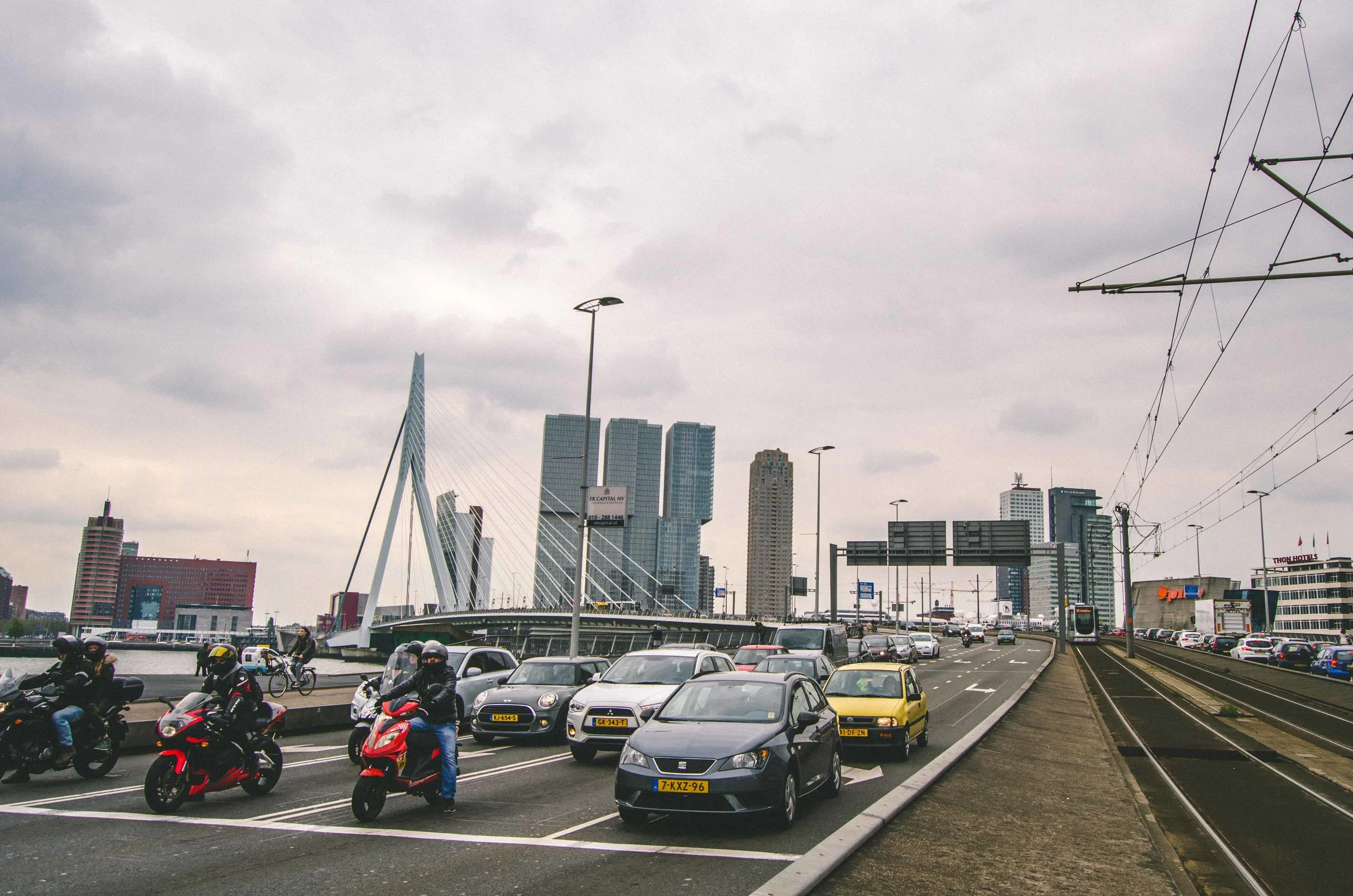 Erasmusbrug (Erasmus Bridge) with separate lanes for pedestrians, cyclists, tram, and cars