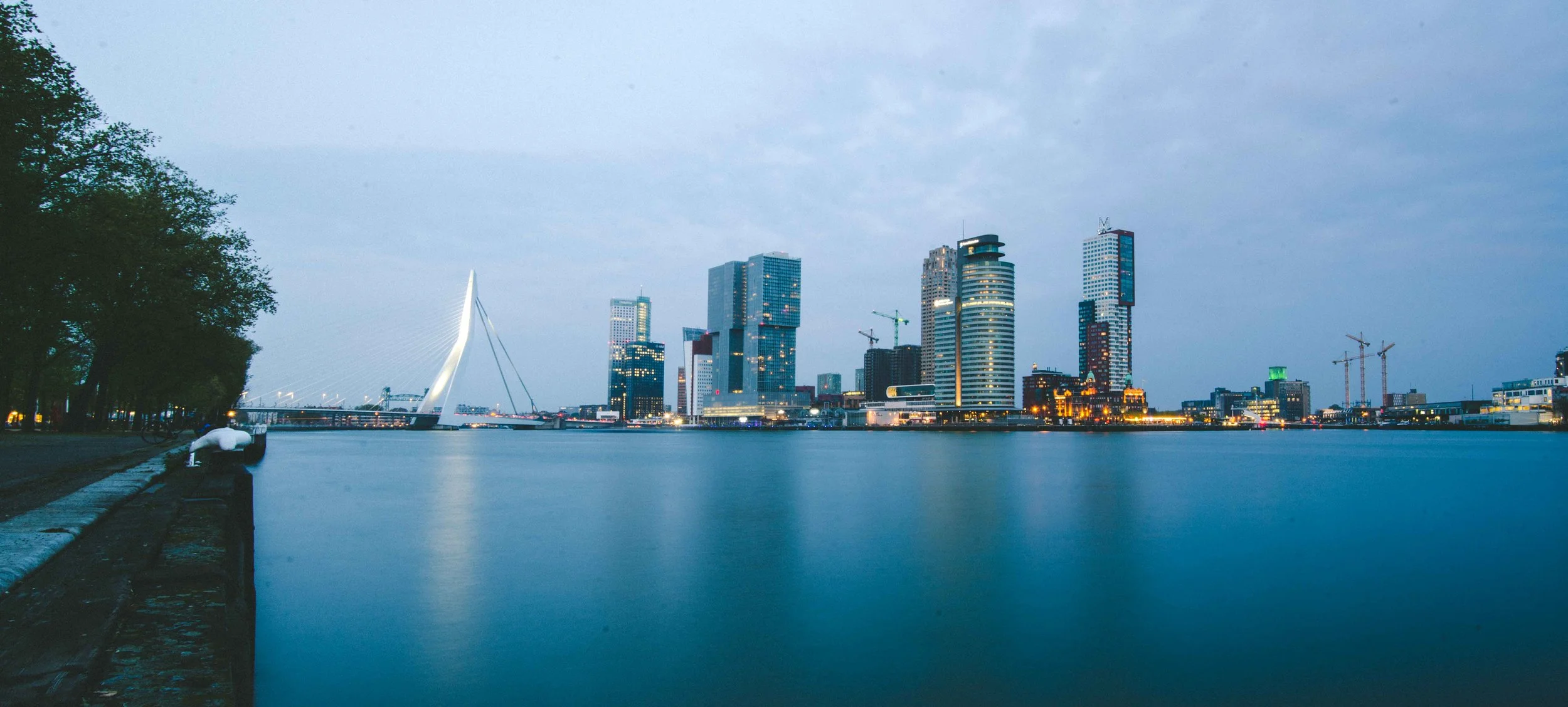 Rotterdam skyline. The smaller building with orange lights along the water is Hotel New York, where my great-grandfather most likely boarded the ship that brought him to the United States.