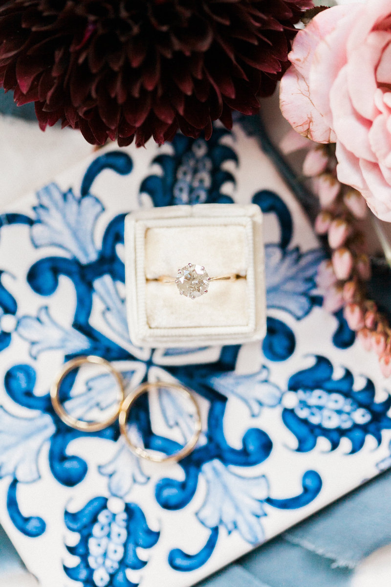 Use a fun patterned background when styling your rings for some visual interest. Styled by The Styled Soiree, Photo by Sara Lynn Photo