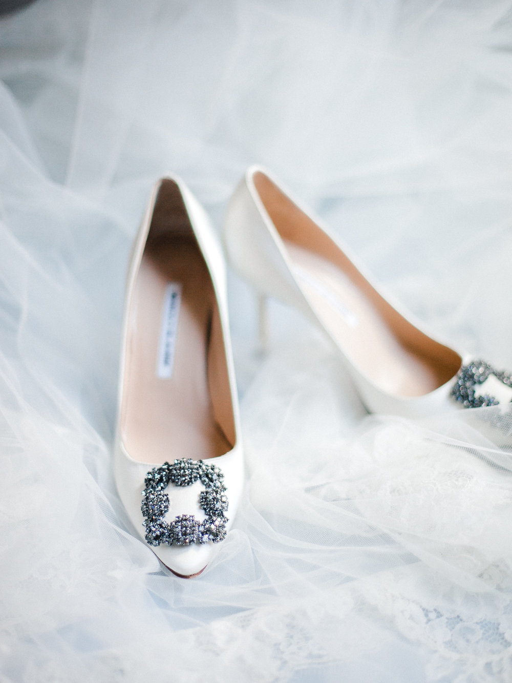 Manolo Blahnik Hangisi wedding shoes in white with a veil