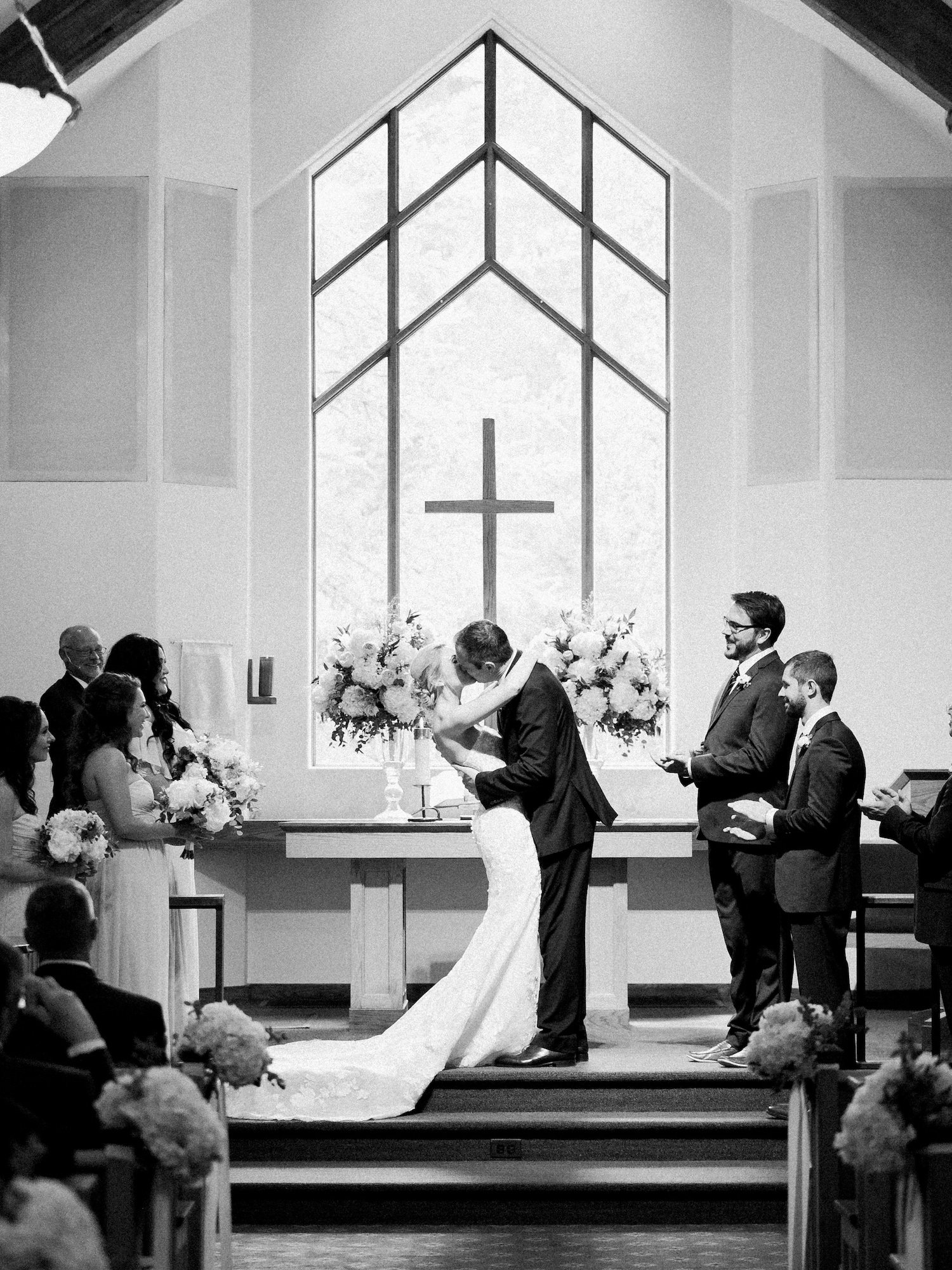 First Kiss at Vail Interfaith Chapel during a wedding ceremony