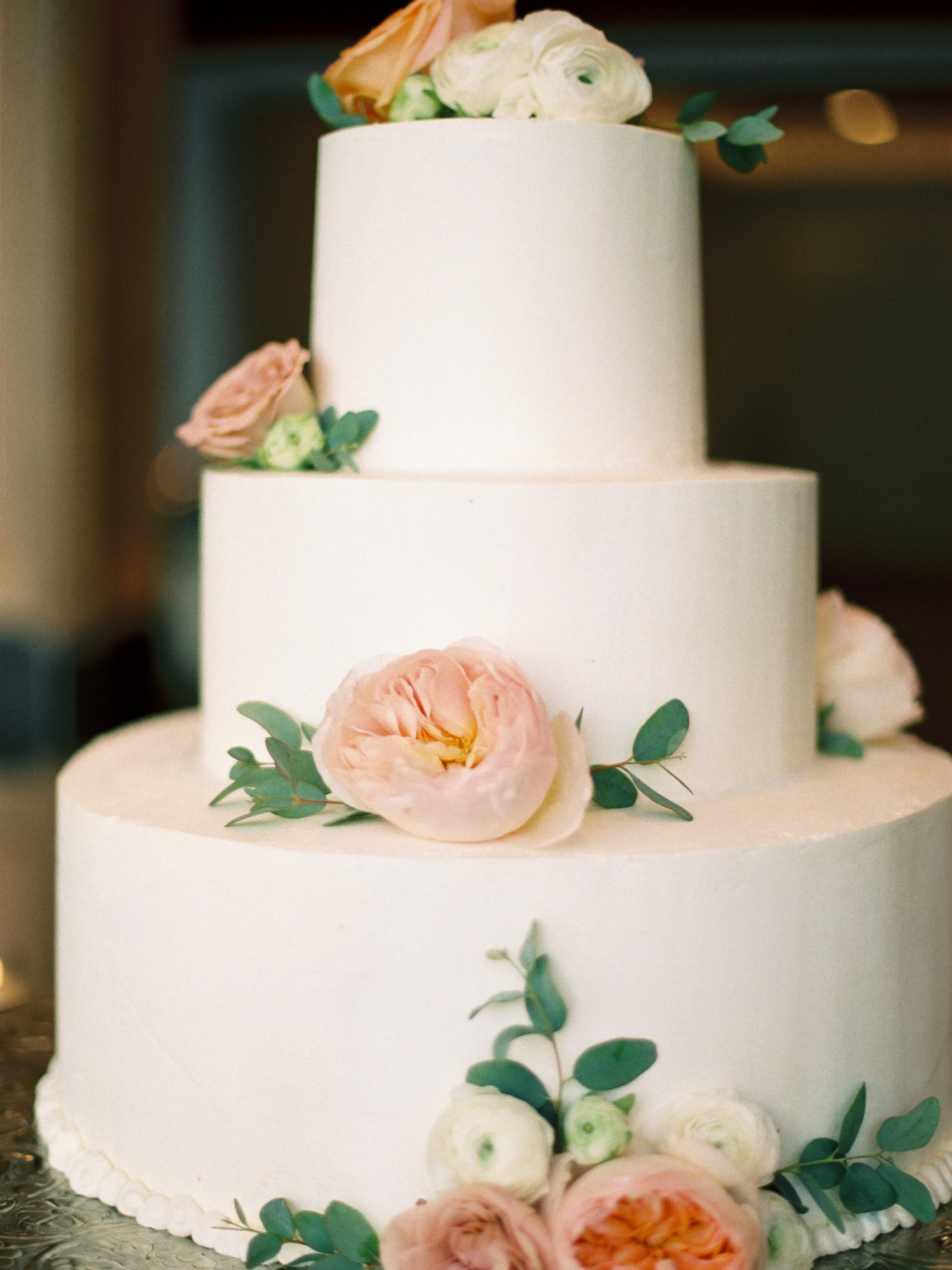 Classic white wedding cake with flowers from The Sonnenalp