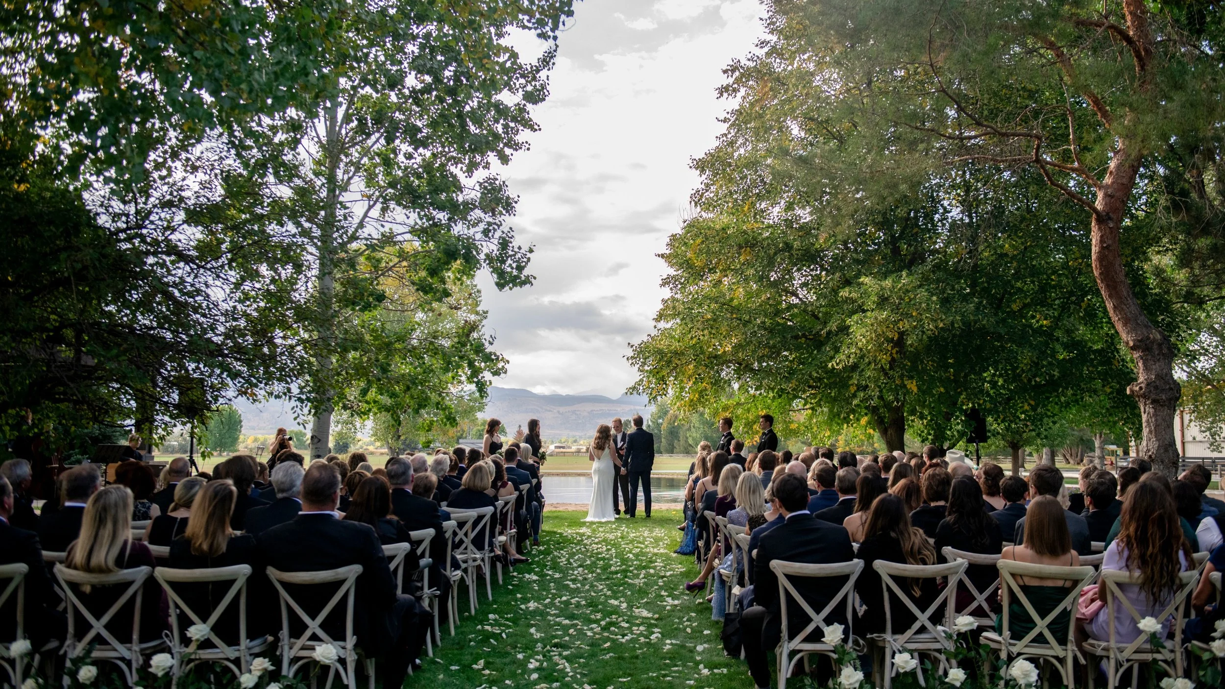 Still one of my favorite ceremony settings. Colorado in early October.

.
.
.
Photography - @lillieelliot
Floral Design - @florabynora_ 
Venue - Private Estate
Rentals - @copartyrentals