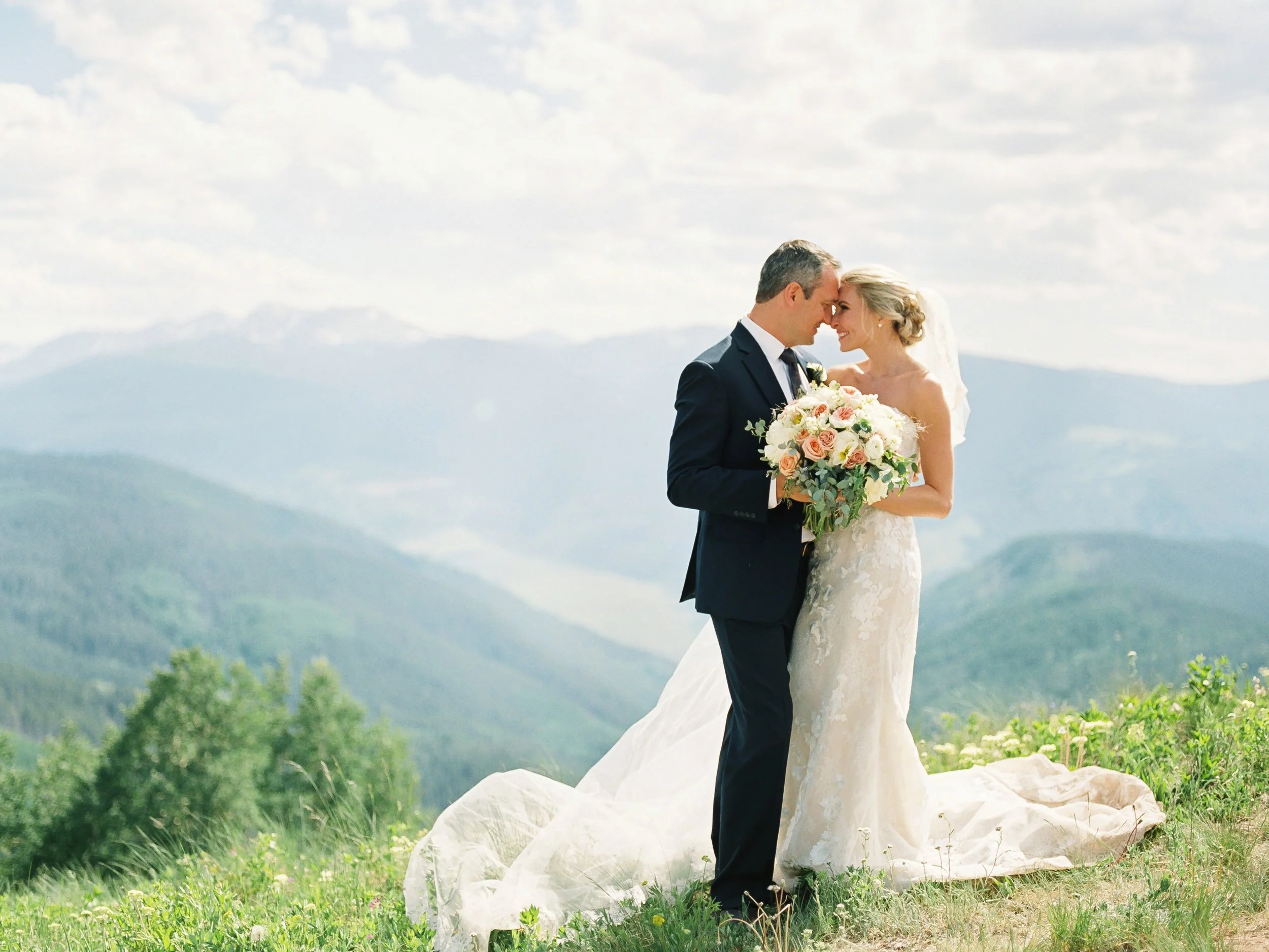 Couple overlooking the mountains during a Vail wedding in Colorado