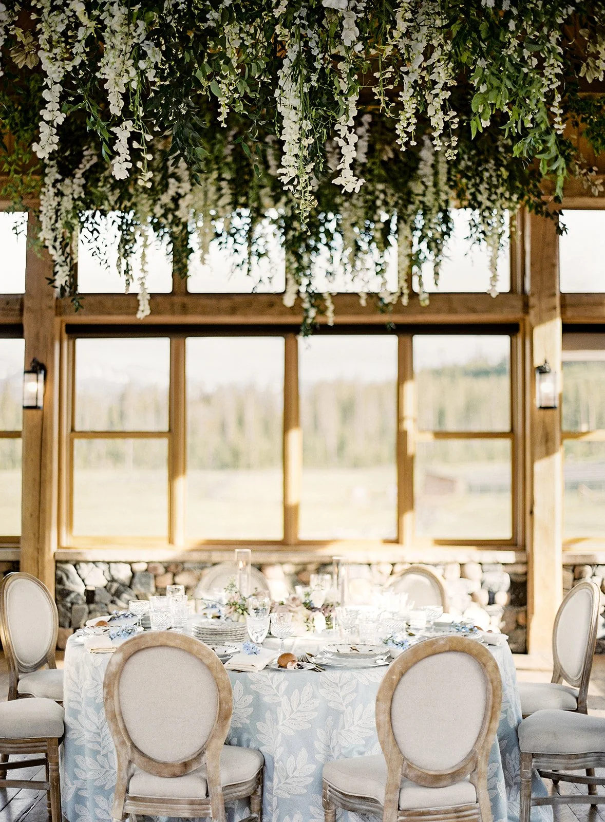 Hanging floral installation in Timber House at Devil's Thumb Ranch