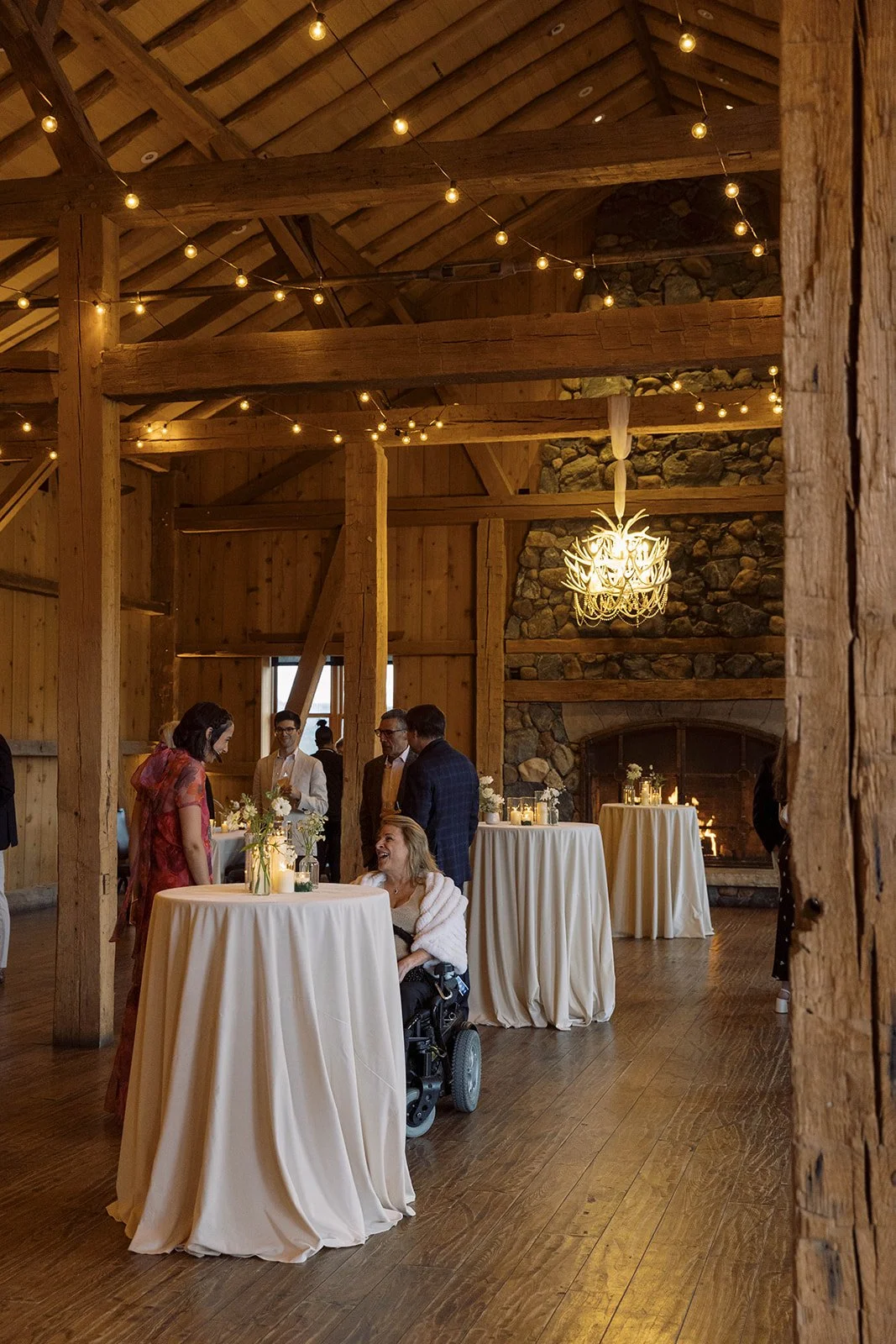 Welcome party inside Broad Axe Barn at Devil’s Thumb Ranch