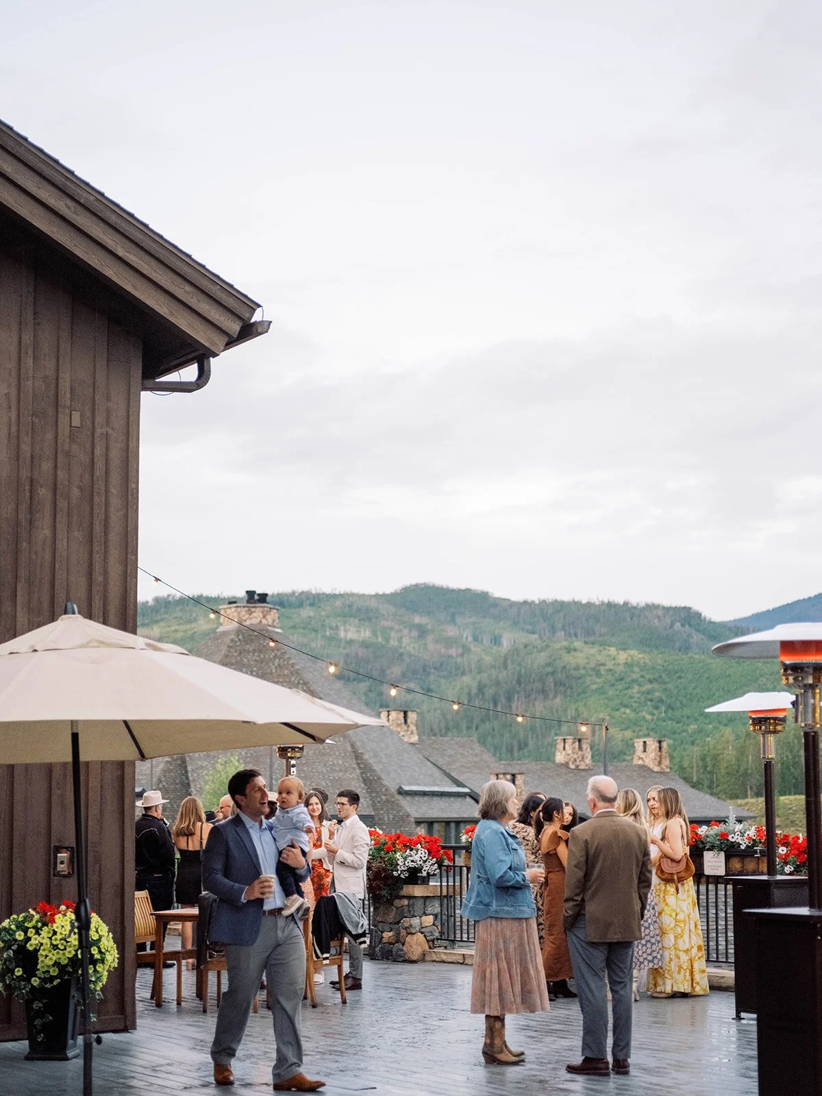 Guests at a welcome party during a Devil’s Thumb Ranch wedding weekend