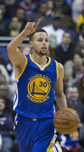 Stephen Curry (above) of the Golden State Warriors this year and Stephen Hawking (below) at NASA in the 1980s. They have more in common than you would think. Photograph of Curry by Keith Allison.