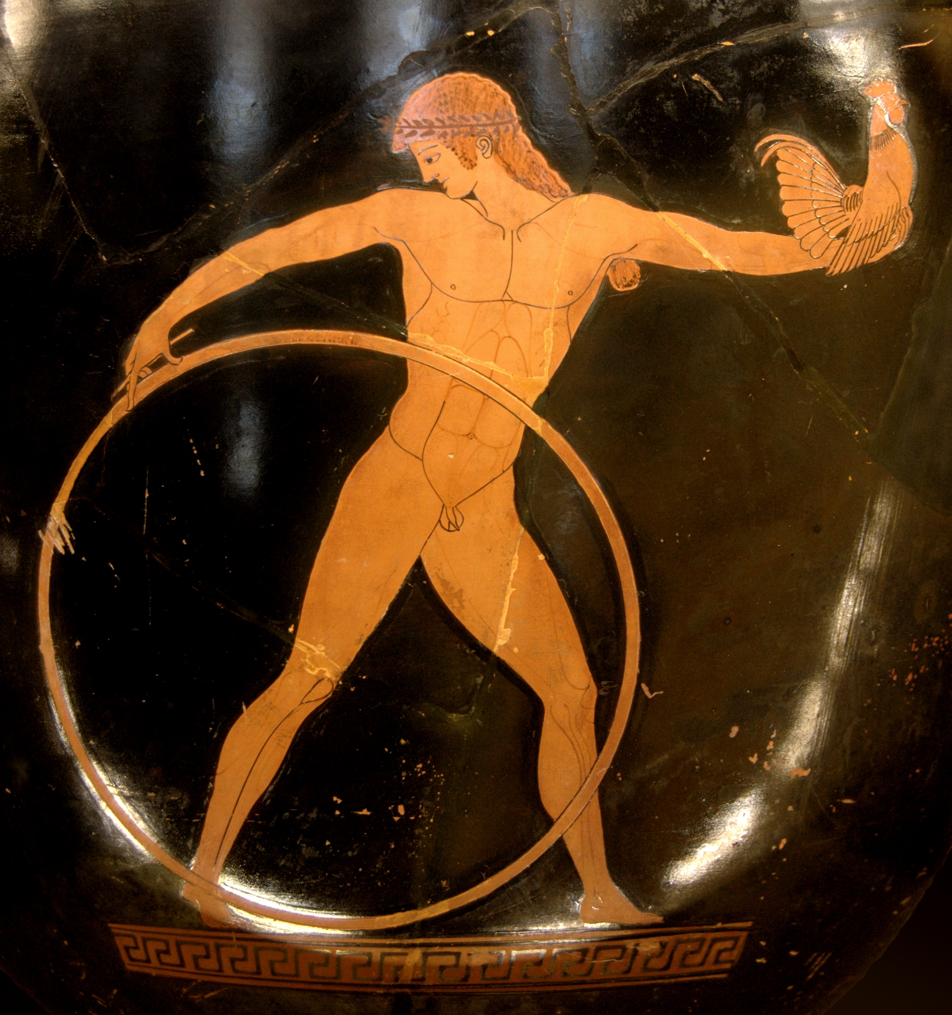 Ganymede, beloved of Zeus and cupbearer to the gods, on an Attic red-figure bell-krater, circa 500-490 B.C.