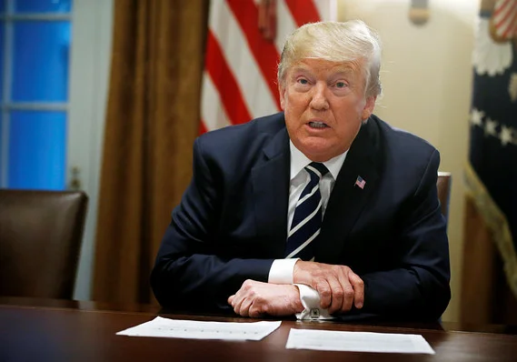 Taken to the woodshed? President Donald J. Trump does an about-face on his Helsinki remarks after his Putin performance received excoriating reviews at home. Image via MarketWatch .