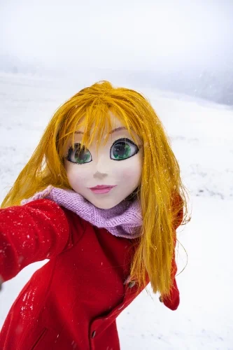 Yellow Hair/Red Coat/Snow/Selfi by Laurie Simmons, 2014