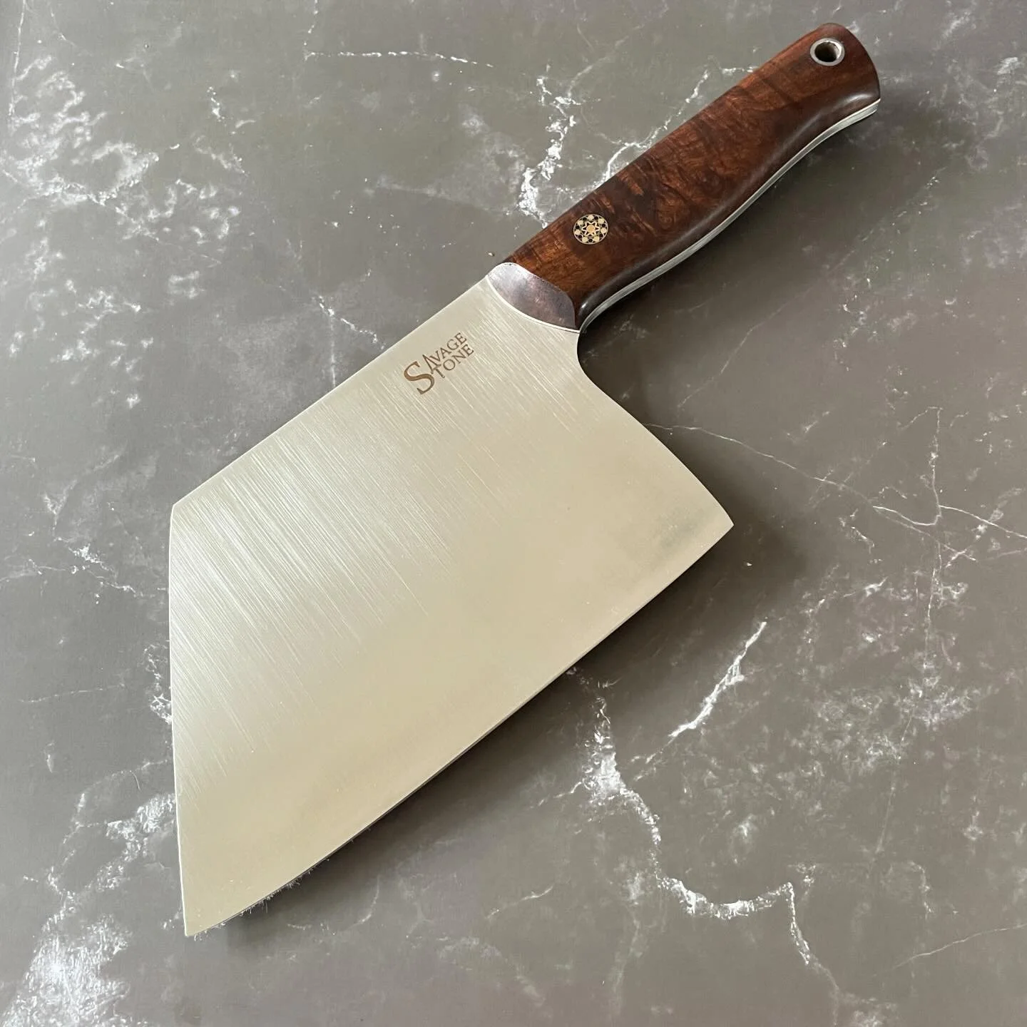 *AVAILABLE* 6.5&rdquo; (4&rdquo; height) K-tip Chef Cleaver in Nitro-V stainless wearing stunning Australian Ringed Gidgee from @kiranskoa w/Ivory G-10 liners; stainless, brass and copper mosaic pin; maple and poplar saya. Balance is right ahead of t