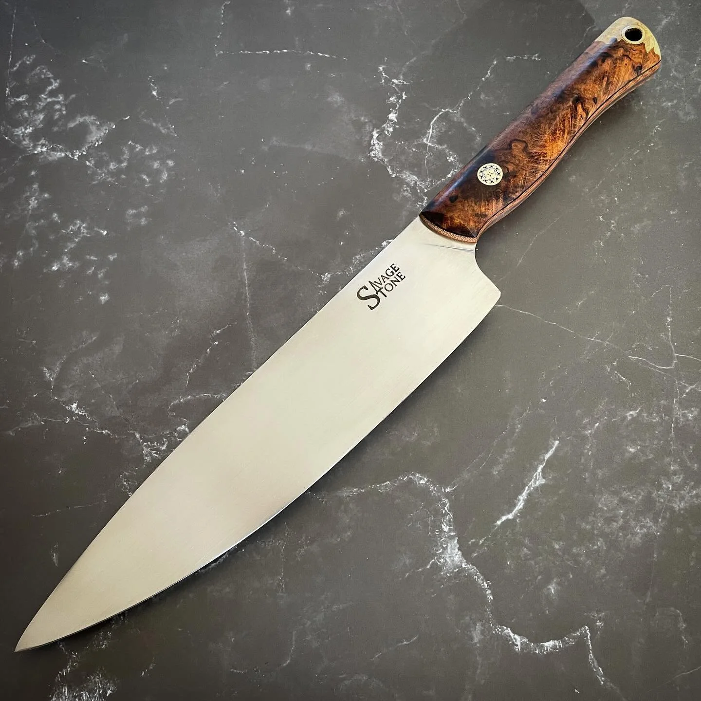 *GONE* locally commissioned 8.25&rdquo; chef knife in Nitro-V wearing Desert Ironwood burl, G10 and micarta. Brass, stainless and copper mosaic pin. Love it when Ironwood burl includes a little touch of the light colored sapwood&hellip;it&rsquo;s the