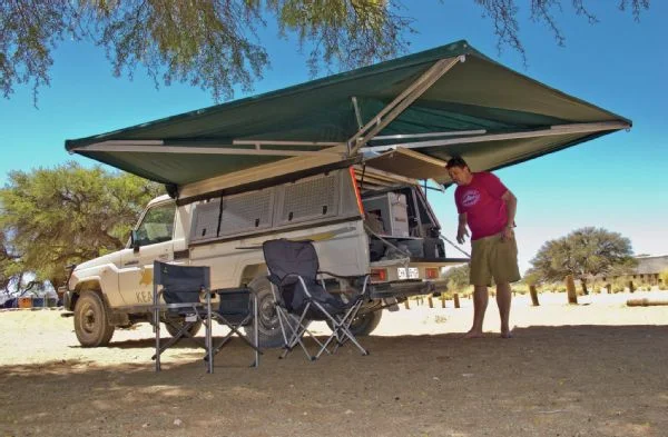 An Ostrich Wing Awning is a must for shade, it also provides shelter from the rain as well.